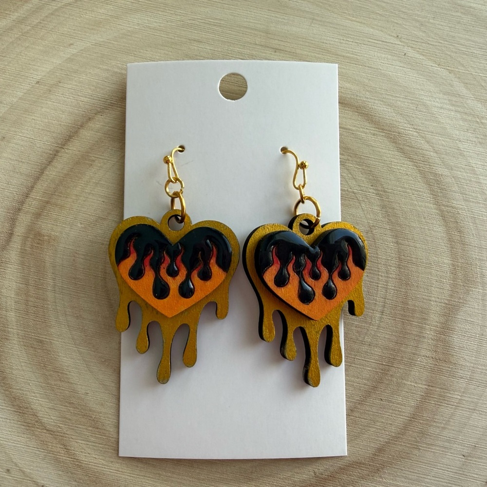 Heart-Shaped Flame Earrings in Black and Gold